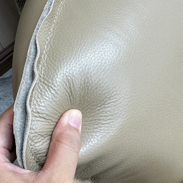 Elegant Cream Leather Sofa with Flared Armrests,Elegant Cream Leather Sofa with Flared Armrests