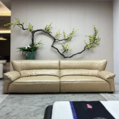 Elegant Cream Leather Sofa with Flared Armrests,Elegant Cream Leather Sofa with Flared Armrests