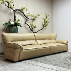 Elegant Cream Leather Sofa with Flared Armrests,Elegant Cream Leather Sofa with Flared Armrests