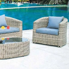 Poolside Wicker Sofa Set with Glass Top Table and Blue Cushions for Outdoor Leisure,Elegant White Wicker Outdoor Sofa Set with Glass Coffee Table for Patio Relaxation