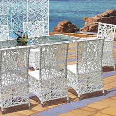 Luxurious White Rattan Outdoor Set with Glass Top and Elegant Backdrop for Beachfront Dining,Luxurious White Rattan Outdoor Set with Glass Top and Elegant Backdrop for Beachfront Dining