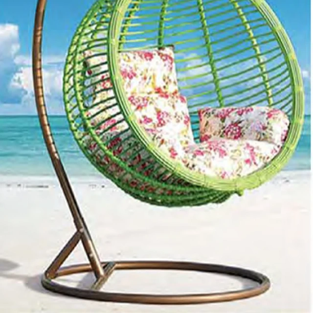 Relaxing Oceanside Rattan Swing Chair with Floral Cushions for Serene Backyard Oasis,Relaxing Oceanside Rattan Swing Chair with Floral Cushions for Serene Backyard Oasis