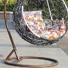 Stylish Black Rattan Outdoor Swing Chair with Vibrant Floral Cushions for Garden Relaxation,Stylish Black Rattan Outdoor Swing Chair with Vibrant Floral Cushions for Garden Relaxation