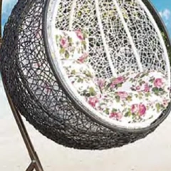 Coastal Chic Black Wicker Hanging Egg Chair with Floral Seat Cushion for Beachside Leisure,Coastal Chic Black Wicker Hanging Egg Chair with Floral Seat Cushion for Beachside Leisure