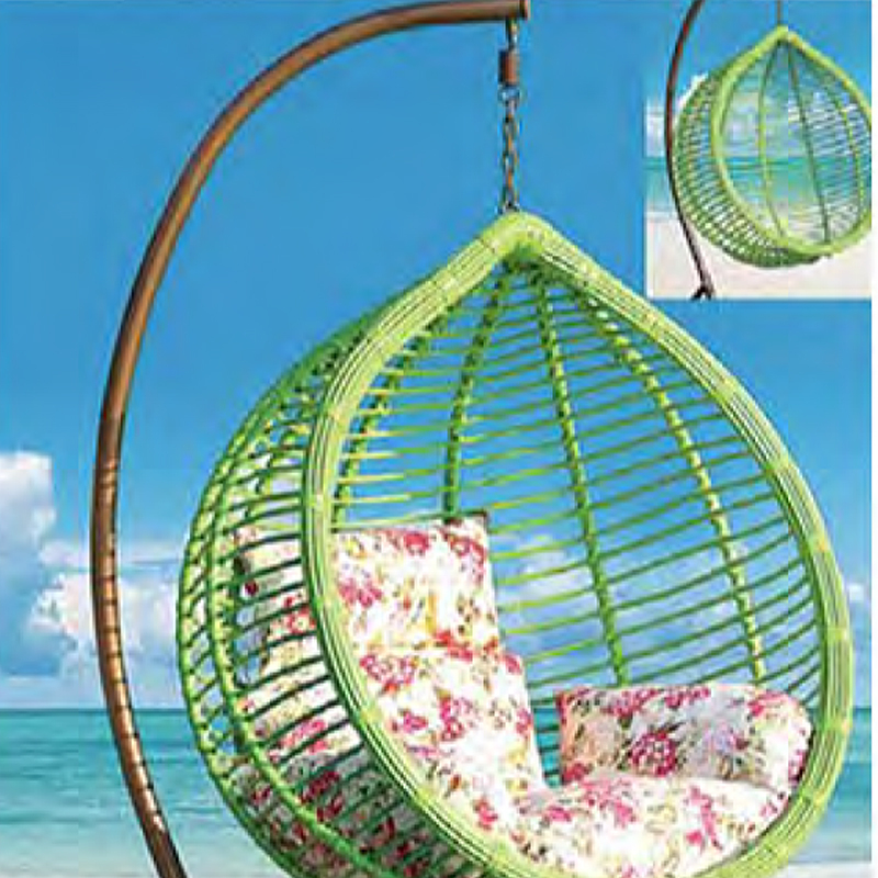 Relaxing Oceanside Rattan Swing Chair with Floral Cushions for Serene Backyard Oasis,Relaxing Oceanside Rattan Swing Chair with Floral Cushions for Serene Backyard Oasis