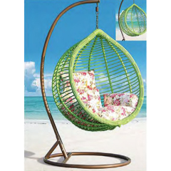 Relaxing Oceanside Rattan Swing Chair with Floral Cushions for Serene Backyard Oasis,Relaxing Oceanside Rattan Swing Chair with Floral Cushions for Serene Backyard Oasis