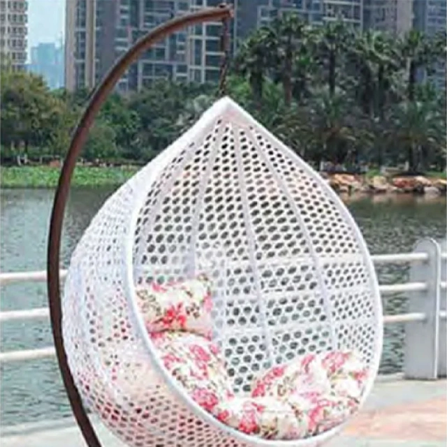 Tranquil White Rattan Outdoor Swing Chair with Refreshing Floral Pattern Cushion for Patio,Stylish Black Rattan Outdoor Swing Chair with Vibrant Floral Cushions for Garden Relaxation