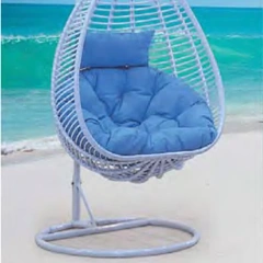 Oceanside White Rattan Swing Chair with Plush Blue Cushion for Coastal Serenity,Rustic Brown Rattan Swing Chair with Sunflower-Inspired Cushion for Garden Comfort