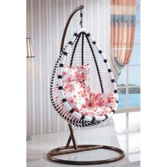 Stylish Indoor-Outdoor Wicker Swing Chair with Floral Cushion for Comfortable Relaxation,Stylish Indoor-Outdoor Wicker Swing Chair with Floral Cushion for Comfortable Relaxation
