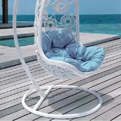 Luxurious White Rattan Swing Chair with Sky Blue Cushion for Seaside Retreat,Rustic Brown Rattan Swing Chair with Sunflower-Inspired Cushion for Garden Comfort