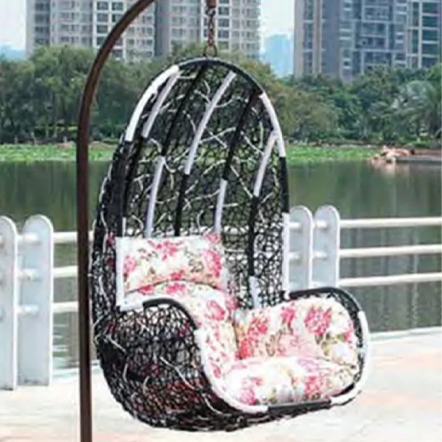 Elegant Dark Rattan Swing Chair with Floral Cushion for Outdoor Tranquility,Rustic Brown Rattan Swing Chair with Sunflower-Inspired Cushion for Garden Comfort