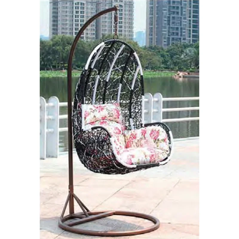 Elegant Dark Rattan Swing Chair with Floral Cushion for Outdoor Tranquility,Rustic Brown Rattan Swing Chair with Sunflower-Inspired Cushion for Garden Comfort