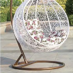Graceful White Rattan Swing Chair with Delicate Floral Cushion for Backyard Retreat,Graceful White Rattan Swing Chair with Delicate Floral Cushion for Backyard Retreat