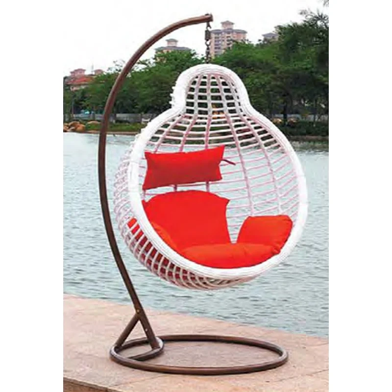 Vibrant White Rattan Swing Chair with Bold Red Cushions for Lakeside Leisure,Vibrant White Rattan Swing Chair with Bold Red Cushions for Lakeside Leisure