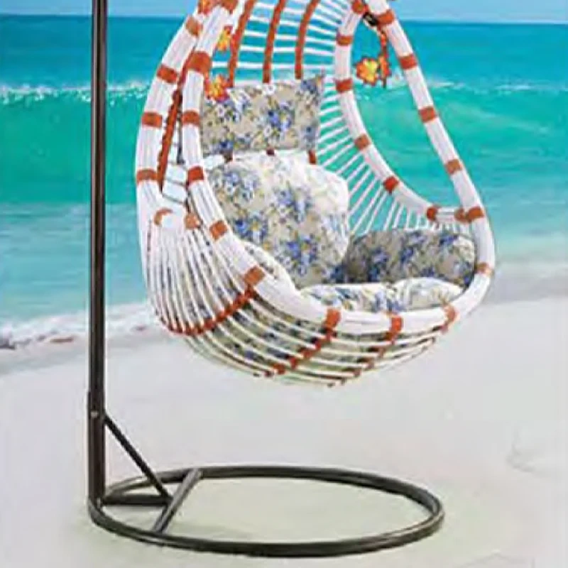 Exotic White and Brown Rattan Swing Chair with Floral Accents for Coastal Relaxation,Exotic White and Brown Rattan Swing Chair with Floral Accents for Coastal Relaxation