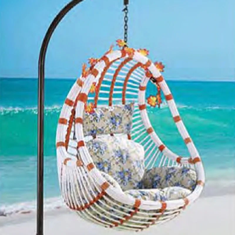 Exotic White and Brown Rattan Swing Chair with Floral Accents for Coastal Relaxation,Exotic White and Brown Rattan Swing Chair with Floral Accents for Coastal Relaxation