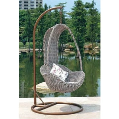 Cozy Brown Rattan Swing Chair with Nature-Inspired Floral Cushion for Outdoor Retreat,Cozy Brown Rattan Swing Chair with Nature-Inspired Floral Cushion for Outdoor Retreat