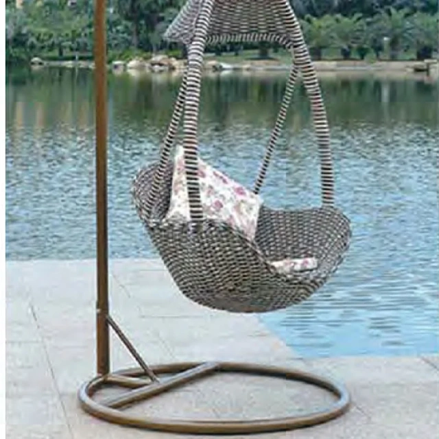 Soothing Brown Rattan Swing Chair with Floral Pattern Cushion for Coastal Relaxation,Soothing Brown Rattan Swing Chair with Floral Pattern Cushion for Coastal Relaxation