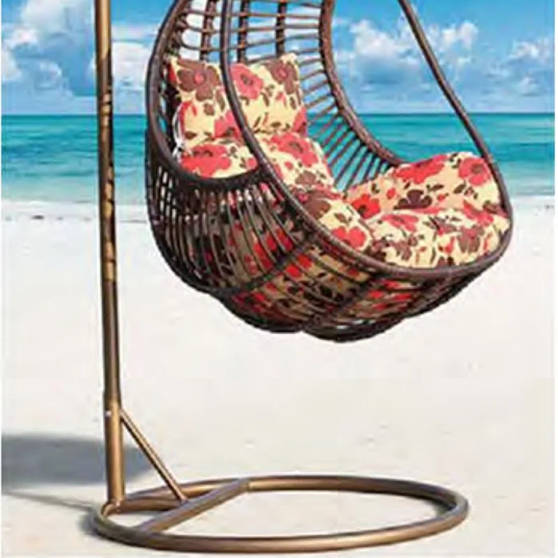 Soothing Brown Rattan Swing Chair with Floral Cushion for a Peaceful Backyard Oasis,Soothing Brown Rattan Swing Chair with Floral Cushion for a Peaceful Backyard Oasis