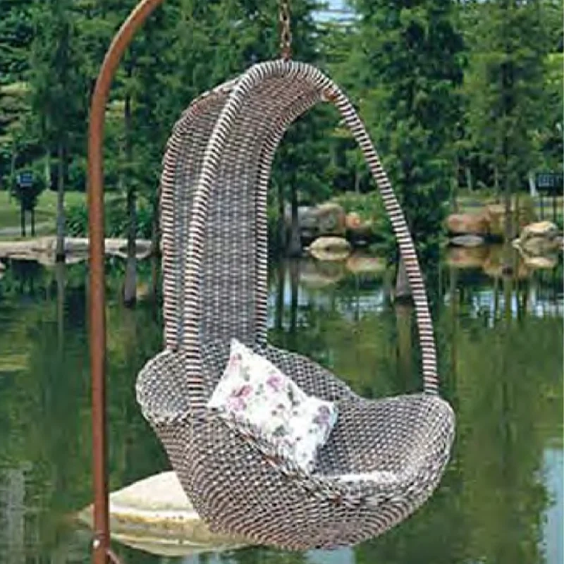 Cozy Brown Rattan Swing Chair with Nature-Inspired Floral Cushion for Outdoor Retreat,Cozy Brown Rattan Swing Chair with Nature-Inspired Floral Cushion for Outdoor Retreat