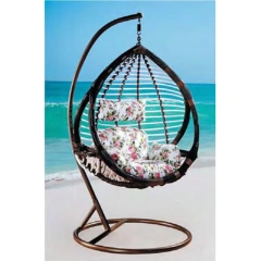 Elegant Dark Rattan Swing Chair with Floral Cushion for Coastal Serenity,Elegant Dark Rattan Swing Chair with Floral Cushion for Coastal Serenity