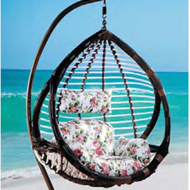 Elegant Dark Rattan Swing Chair with Floral Cushion for Coastal Serenity,Elegant Dark Rattan Swing Chair with Floral Cushion for Coastal Serenity