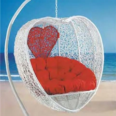 Romantic White Rattan Swing Chair with Heart-Shaped Red Cushion for Beachside Serenity,Romantic White Rattan Swing Chair with Heart-Shaped Red Cushion for Beachside Serenity