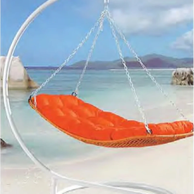 Sleek White Rattan Swing Chair with Vibrant Orange Cushion for Coastal Relaxation,Sleek White Rattan Swing Chair with Vibrant Orange Cushion for Coastal Relaxation