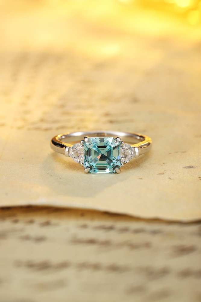 Emerald-Cut Lab-Grown Paraiba Tourmaline Three-Stone Ring in Sterling Silver
