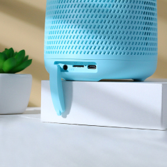 Latest adorable mini speaker ktv wireless mic with button to adjust volume mini wireless BT speaker Priority Promotional for Kid