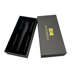 Gold logo printed on black rectangular specialty paper. Optional paper packaging for luxury gift wrapping.