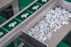 Máquina empacadora de herrajes para gabinetes de cocina