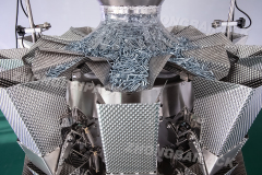 Máquina pesadora y envasadora de tornillos
