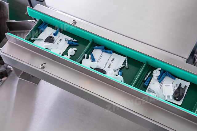 Máquina envasadora de tornillos y piezas plásticas