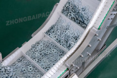 Máquina encajadora de tuercas