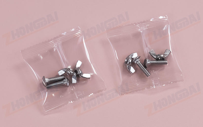 Maszyna pakująca śruby i nakrętki skrzyłkowe