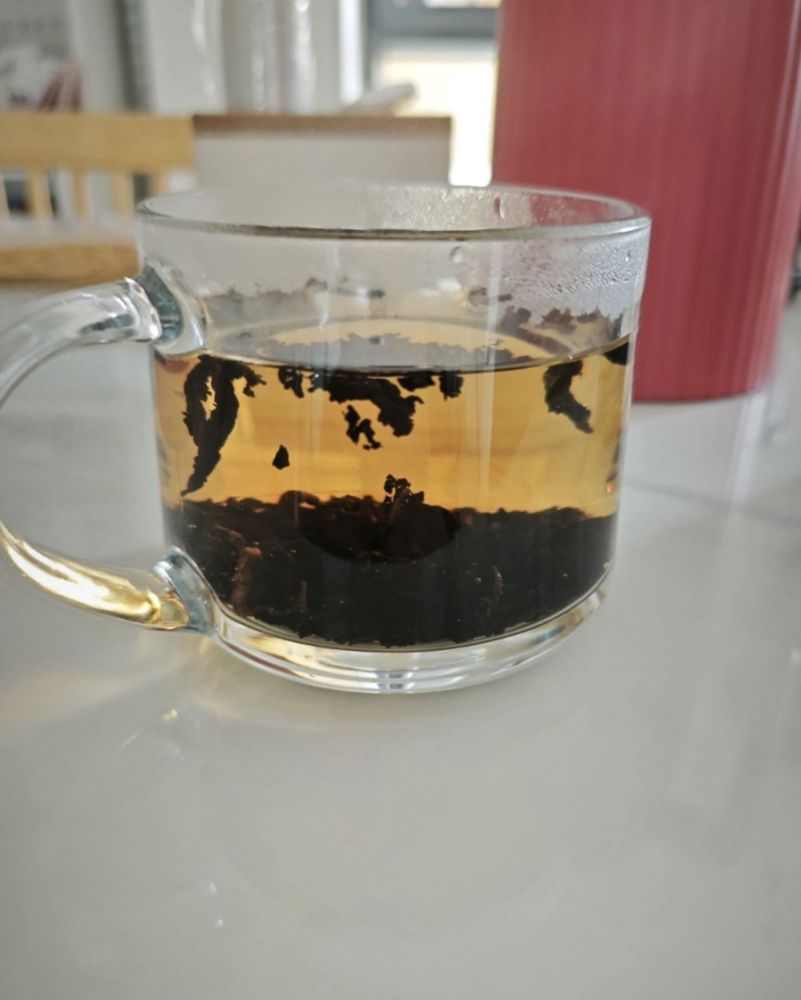Small Paper Can of Dark Oolong Tea