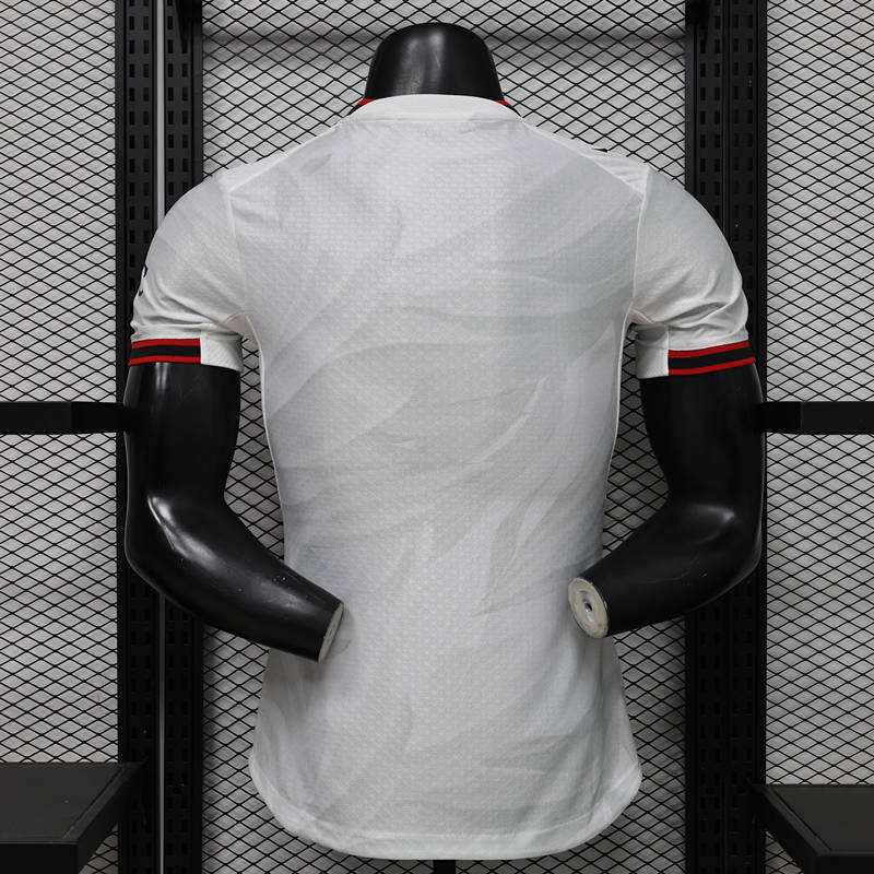 Back view of the AC Milan away white jersey, highlighting the player-style fit and smooth white design