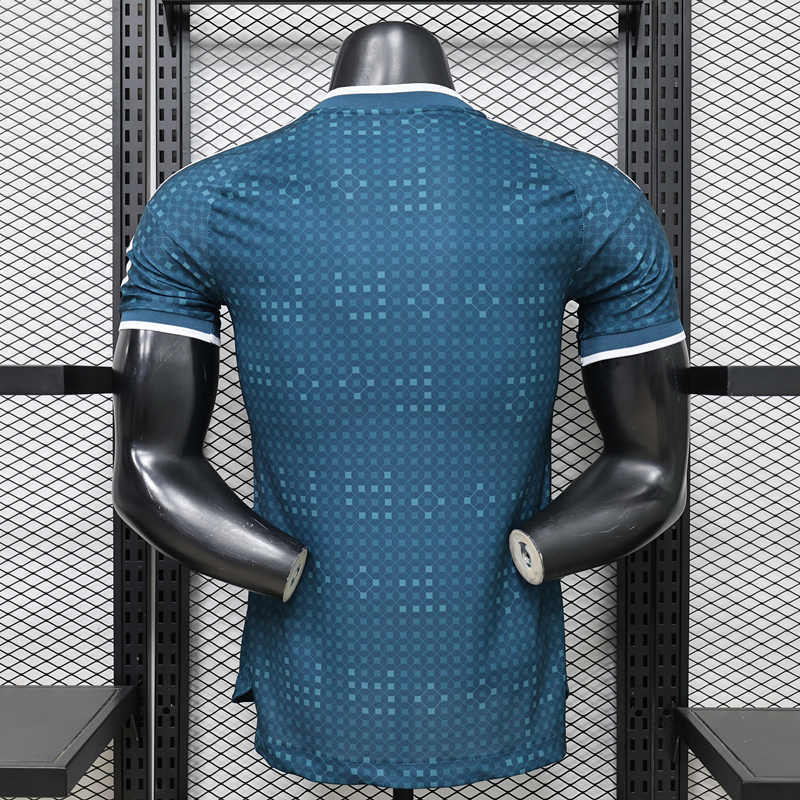Blue away-style football jersey shown from the back, highlighting the player-fit cut and smooth finish