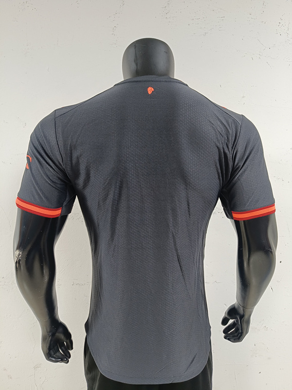 Back view of AC Milan 26-27 black away jersey showing player version fit and sleek panel design
