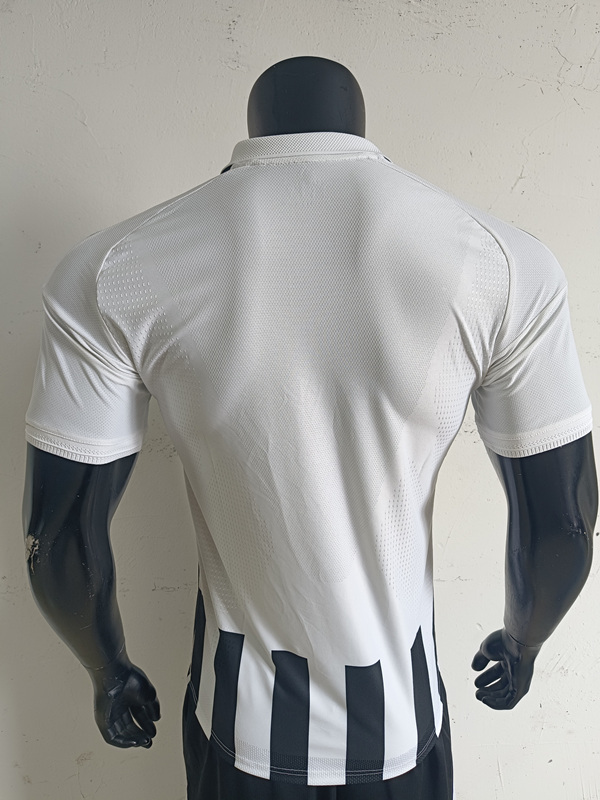 Back view of the Juventus home replica jersey showing the clean black and white layout and player version fit