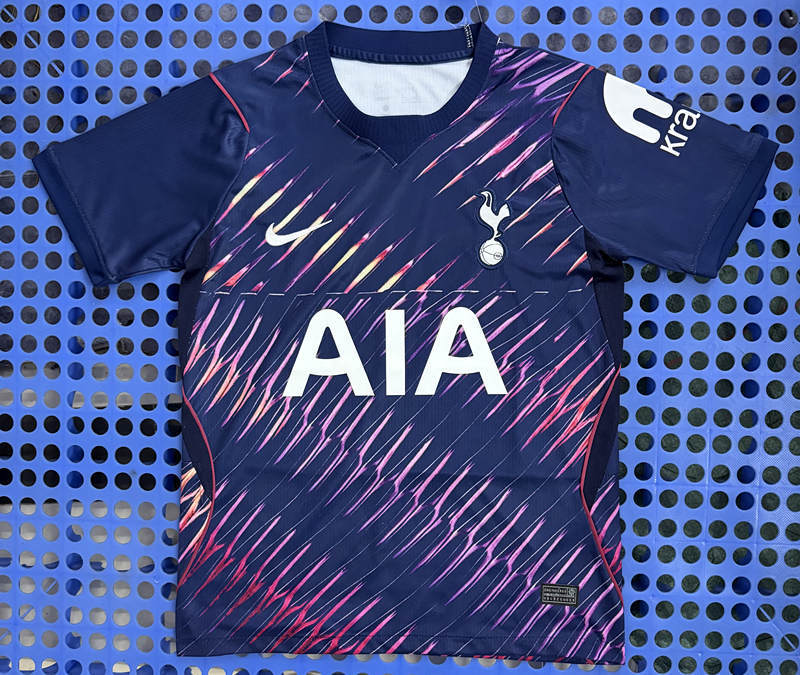Front view of the 26-27 Tottenham Hotspur away blue Thailand soccer jersey with club-style details