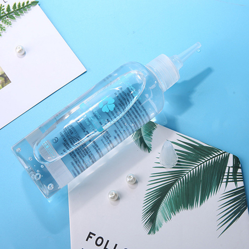 زجاجة كبيرة من زيت التشحيم بالحمض الهيالورونيك زيت التشحيم للمثليين زيت التشحيم لجسم الإنسان