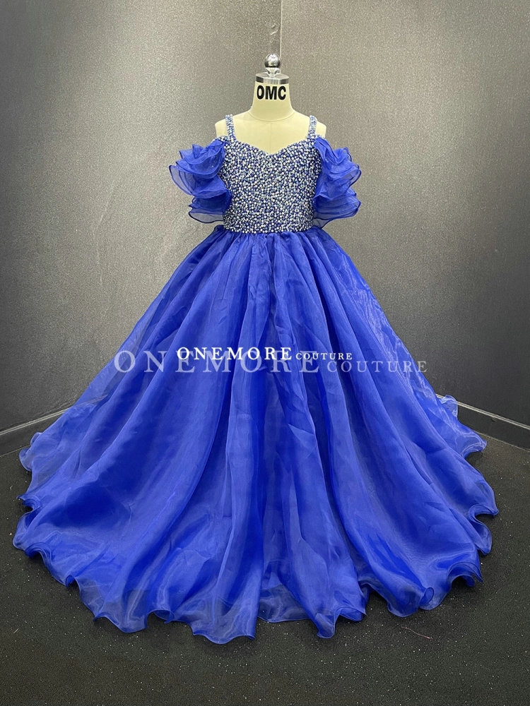 Royal Blue Organza Pageant Gown with Fully Stoned Top and Puffy Sleeves Royal Blue Organza Pageant Gown with Fully Stoned Top and Puffy Sleeves