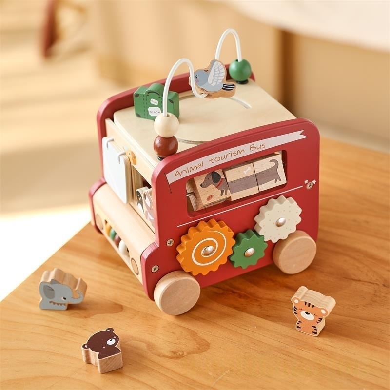 Hexahedral busy box pushcart bus toy