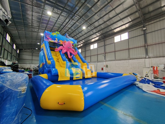 Inflatable slide with pool
