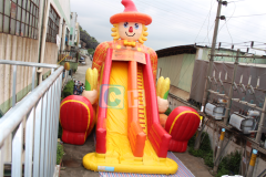 Inflatable slide into pool