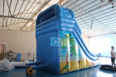 Inflatable swimming pool with slide