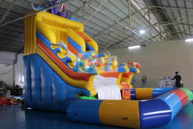 Giant inflatable pool with slide