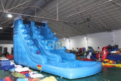 Inflatable swimming pool and slide